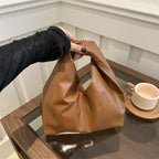 Gelyn Clutch Leather Bag