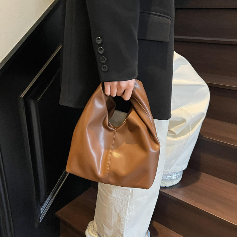 Gelyn Clutch Leather Bag