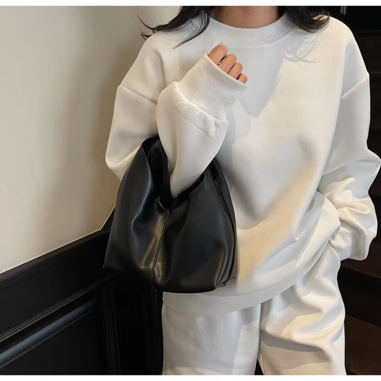 Gelyn Clutch Leather Bag